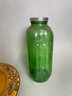 Green Water Bottle, Bankers Lamp And Wooden Plate