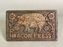 A Vintage Cast Iron Bacon Press