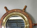 A Vintage Wooden Ships Wheel & Brass Porthole Mirror