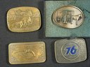 FOUR VINTAGE BELT BUCKLES INCLUDES TWO SMITH AND WESSON BELT BUCKLES