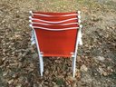Telescope Vibrant Red Orange, Stackable Sling Chairs.