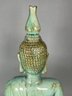 A Beautiful Turquoise Green Ceramic Buddah