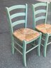 Four Green Painted Rush Seat Chairs