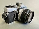 Olympus OM 1 35 Mm Camera And 3 Lenses