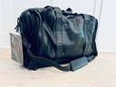 Tumi Black Leather Expandable Travel Bag