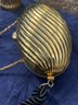 Gold Metal Clutch Purse With Shoulder Chain Or Wrist Strap