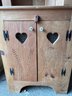 Carved Corner Country Cupboard With Heart Cutout Detail