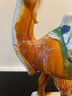 Collection Three Glazed Ceramic Horse Figurines & One Camel