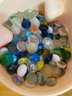 Container Of Glass Pieces And Marbles