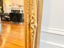 Oversized Gold Painted And Floral Decorated Beveled Mirror