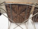Two Metal Chairs With Woven Seats