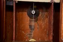 Antique Mahogany Pillar And Scroll Mantel Clock