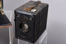 Collection Of Six Antique Box Cameras And One Movie Camera