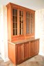 A Custom Plain & Fancy Stand Alone Stepped Glass Door Cupboard With Granite Counter