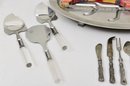 Gentry Stainless Steel Serving Platter, Bread Cutter, Set Of Three Cheese Cutters, And More
