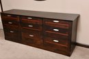 Nine Drawer Wood Dresser With Matching Oval Wall Mirror