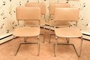 Set Of Four Vintage Tubular Steel Cantilever Dining Chairs