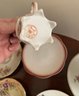 Eleven Tea Cups And Saucers And One Creamer