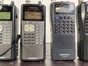 Group Of (6) Radio Shack Handheld Scanners - All Power On