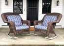 A Pair Of Resin Porch Rockers With Cushions