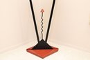 Amisco Memphis Style Wood And Black Metal Geometric Triangular Pedestal Table
