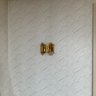 A Pair Of Mod 70's Smoked Glass Gold Sconces