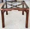 A Vintage Rattan Dining Table With Glass Top, Likely Mcguire