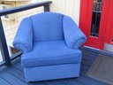 A Blue Upholstered Sofa Chair