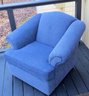 A Blue Upholstered Sofa Chair