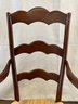 A Vintage French Country Ladderback Arm Chair With Rush Seat