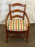 A Vintage French Country Ladderback Arm Chair With Upholstered Seat