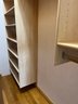 A Wood Built In Closet System - Hallway
