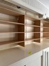 A Wood Built In Storage System - Linen Closet