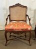 A Pair Of Vintage French Country Caned & Carved Arm Chairs