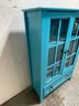 Blue Tall Cabinet With Glass And Drawer
