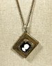 1920s Gilt Brass And Cameo Book Formed Locket Necklace