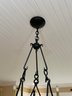 A Very Large Wrought Iron Chandelier