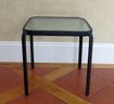 A Glass Topped Square Metal Side Table