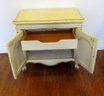 A Pair Of French Provincial Two Door Night Stands