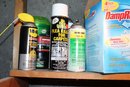Two Tired Work Bench Full Of Mixed Indoor/Outdoor Cleaners, Sprays, Oils, Etc.