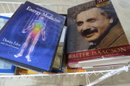 Books - Lot 1 -  Misc. Books, DVDs, And  White Metal Cart