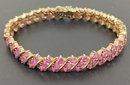 AMAZING GOLD OVER STERLING SILVER RUBY ROWS BRACELET