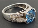 BEAUTIFUL FACETED BLUE TOPAZ & CZ RING