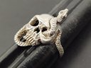 VINTAGE STERLING SILVER SKULL WITH A SNAKE RING
