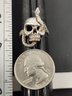 VINTAGE STERLING SILVER SKULL WITH A SNAKE RING
