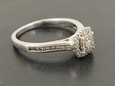 VINTAGE STERLING SILVER DIAMOND HALO ENGAGEMENT RING
