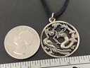 STERLING SILVER DRAGON MEDALLION PENDANT ON SILK NECKLACE