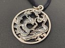 STERLING SILVER DRAGON MEDALLION PENDANT ON SILK NECKLACE
