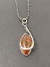 VINTAGE STERLING SILVER NECKLACE WITH MID CENTURY AMBER PENDANT
