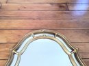 Arch-shaped Gilt Colored Mirror
